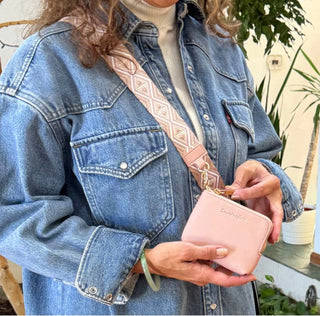 woman carrying clip & Go phone holder with pouch
